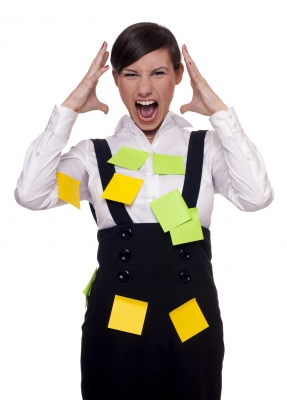 A girl with many post-it on her is Overwhelmed With Too Many Tasks