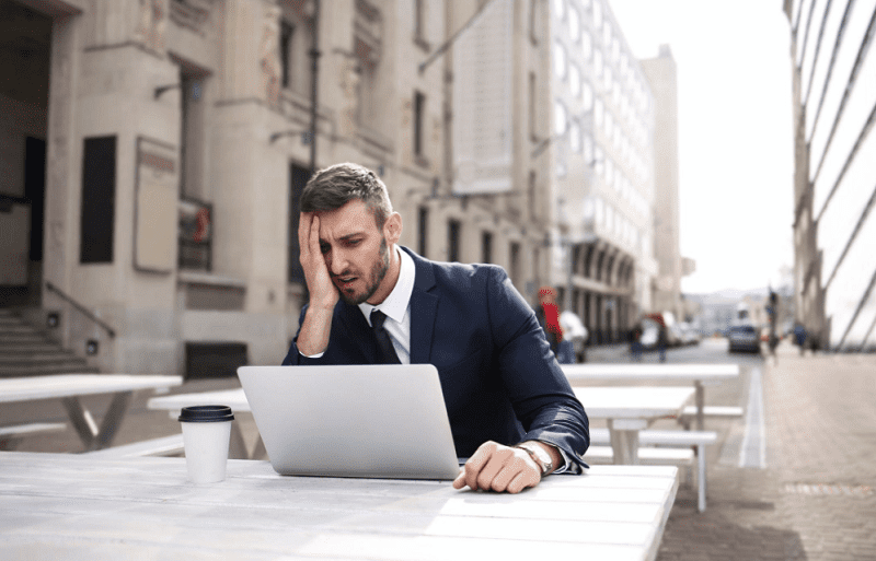 https://www.pexels.com/photo/man-in-black-suit-covering-his-face-with-right-hand-3777554/